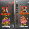 Two dark packaging boxes for cannabis products standing side by side, featuring cartoon red characters and the word BLASTED with INDICA and 2000mg text visible.