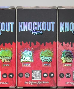 Three KO Knockout Vapes boxes lined up side by side, showing holographic 'KNOCKOUT Vapes' branding and red fruit-pattern artwork at the bottom.